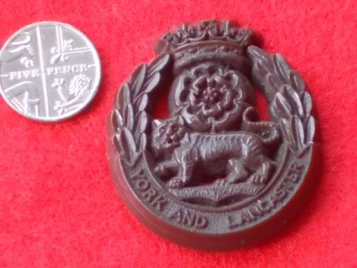 WW11 Plastic Cap Badge - York and Lancaster Regiment
